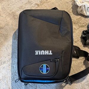 Thule Black Sling Bag with Blue Accent